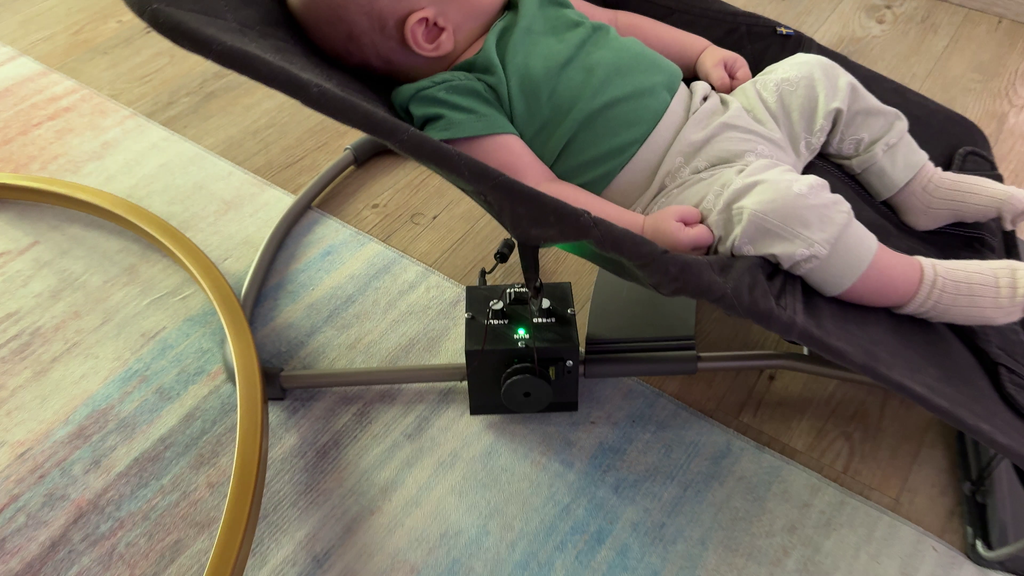 Automatic naptime with a BabyBjorn bouncing servo